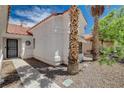 Home featuring desert landscaping, providing a private entrance and curb appeal at 4612 Standing Bluff Way, Las Vegas, NV 89130