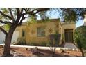 Charming single story home featuring xeriscaping, desert landscaping, and a two-car garage at 1504 Andrew David Ave, North Las Vegas, NV 89086