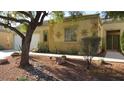 Charming single story home featuring xeriscaping, desert landscaping, and a two-car garage at 1504 Andrew David Ave, North Las Vegas, NV 89086