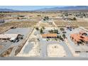 Expansive aerial view of the property showing the surrounding landscape and neighborhood at 2730 Banyon St, Pahrump, NV 89048