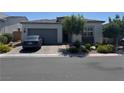 Charming single-story home features a two-car garage and a beautifully landscaped front yard at , Las Vegas, NV 89166
