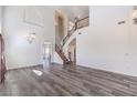 Spacious living room boasts soaring ceilings, hardwood floors, and abundant natural light at 11219 Playa Bonita Ave, Las Vegas, NV 89138