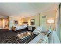Relax in this lovely bedroom, featuring a sitting area, desk and king-sized bed at 2000 N Fashion Show Dr # 2308, Las Vegas, NV 89109