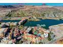 Beautiful aerial shot showcasing the community's waterfront location, golf course and surrounding mountains at 30 Strada Di Villaggio # 227, Henderson, NV 89011