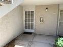 A well-maintained front entrance with visible unit numbers and concrete pathway at 3150 Soft Breezes Dr # 1192, Las Vegas, NV 89128