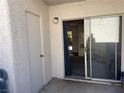 Private patio with sliding glass door, additional storage closet and neutral paint at 3150 Soft Breezes Dr # 1192, Las Vegas, NV 89128