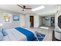 Airy bedroom with a skylight, en-suite bathroom, and walk-in closet providing ample natural light at 5800 Auborn Ave, Las Vegas, NV 89108