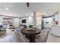 Cozy living area featuring an open floor plan and seamless flow into the adjacent kitchen at 5800 Auborn Ave, Las Vegas, NV 89108
