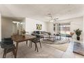 Cozy open-concept living room featuring sliding glass doors for seamless indoor-outdoor living at 5809 Pebble Beach Blvd, Las Vegas, NV 89108