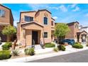 Well-kept two-story home boasting desert landscaping, inviting entrance, and private balcony at 9112 Picturesque Ave, Las Vegas, NV 89149