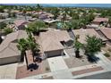 Aerial view of a lovely single-story home with desert landscaping, and a well maintained neighborhood at 2118 High Mesa Dr, Henderson, NV 89012