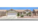 Charming single-story home with a well-maintained front yard and two car garage at 2738 Sandalwood Ave, Henderson, NV 89074