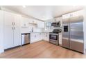 Bright kitchen features white cabinets, stainless steel appliances, and a modern design at 2878 El Cajon St, Las Vegas, NV 89169