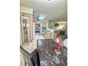 Open concept kitchen with stainless steel appliances and ample cabinet space at 3101 Casey Dr # 204, Las Vegas, NV 89120