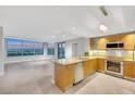 Modern kitchen with granite countertops, stainless steel appliances, and city view at 322 Karen Ave # 2501, Las Vegas, NV 89109