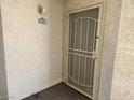 Close-up of front door with secure metal screen, and unit number 2070 at 3550 Bay Sands Dr # 2070, Laughlin, NV 89029