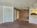 Comfortable living room with ceiling fan and convenient access to the kitchen at 3550 Bay Sands Dr # 2070, Laughlin, NV 89029