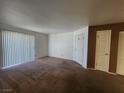 Spacious living room with sliding glass door for natural light and outdoor access at 3550 Bay Sands Dr # 2070, Laughlin, NV 89029