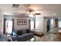 Open-concept living room featuring a ceiling fan, recessed lighting, and seamless flow at 6283 Lapilli Ave, Las Vegas, NV 89139