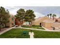 Community features green spaces, picnic table and grill, and a pool with lush landscaping at 8101 W Flamingo Rd # 2110, Las Vegas, NV 89147