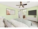Relaxing bedroom showcases a soothing color scheme and plenty of space at 10557 Bandera Mountain Ln, Las Vegas, NV 89166