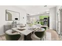 Inviting dining area boasts modern furnishings and ample natural light at 10557 Bandera Mountain Ln, Las Vegas, NV 89166