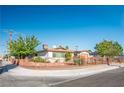 Charming single-story home with a well-maintained yard, gated entrance, and attached one-car garage at 1716 Luning Dr, Las Vegas, NV 89106