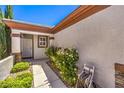 Close-up of front entrance with a white door and desert landscaping at 2540 Binary Stars St, Henderson, NV 89044