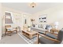 Cozy living room with a neutral color palette, comfortable seating, and modern decor, creating a welcoming atmosphere at 2755 Asgard Ave, Las Vegas, NV 89121