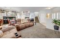 Comfortable living room with neutral tones, plush seating, and a cozy atmosphere at 2856 Trossachs St, Henderson, NV 89044