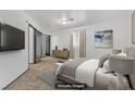 Bright bedroom featuring neutral tones, soft lighting, and comfortable decor, virtually staged at 538 Kristin Ln, Henderson, NV 89011