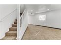 Staircase featuring carpeted steps and a white railing at 538 Kristin Ln, Henderson, NV 89011