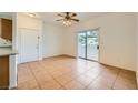 Bright, tiled living room featuring sliding glass doors to the outside at 5650 E Sahara Ave # 1001, Las Vegas, NV 89142