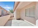 The property showcases a secure gated entry and a covered patio for enhanced privacy and curb appeal at 7920 Turtle Island Ct, Las Vegas, NV 89129