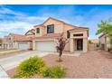 Well-maintained home with drought-resistant landscaping and a spacious two-car garage at 120 Wynntry Dr, Henderson, NV 89074