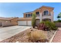 Attractive two-story home with a two-car garage, well-maintained landscaping, and a balcony at 1798 Lakewood Dr, Henderson, NV 89012