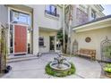 A private courtyard includes mature landscaping and a fountain at 2008 Winter Wind St, Las Vegas, NV 89134