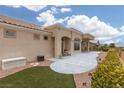 Backyard patio, landscaping, and desert rock at 2624 Spalding Dr, Las Vegas, NV 89134