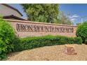 An 'Iron Mountain Ranch' sign is surrounded by landscaping and decorative stone at 5004 Ironhorse Ranch Ave, Las Vegas, NV 89131