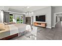 Serene main bedroom with a fireplace and backyard access, providing a private retreat at 5680 N Fort Apache Rd, Las Vegas, NV 89149