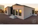 Contemporary home with a minimalist aesthetic, showcasing clean lines and simple landscaping at 1321 Blagg, Pahrump, NV 89048