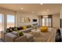 Bright living room featuring desert views, contemporary decor, and comfortable seating arrangements at 1321 Blagg, Pahrump, NV 89048
