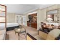 Inviting living space with kitchenette, a dining area and a cozy seating area at 135 E Harmon Ave # 407, Las Vegas, NV 89109