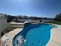 Sparkling pool with serene water view, ideal for relaxation and enjoying the picturesque surroundings at 2469 Sun Reef Rd, Las Vegas, NV 89128