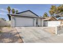 Great view of home, including two car garage and low maintenance front yard at 59 N Christy Ln, Las Vegas, NV 89110