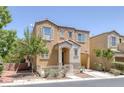 Charming home featuring a covered entryway and neat landscaping, creating a welcoming curb appeal for potential homeowners at 9100 Hombard Ave, Las Vegas, NV 89148