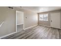 Inviting living area features durable floors and an open doorway at 1381 E University Ave # 204, Las Vegas, NV 89119