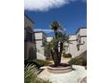 Beautiful exterior showcasing landscaped area and well maintained building with inviting community atmosphere at 3150 Soft Breezes Dr # 1167, Las Vegas, NV 89128