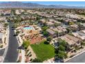 A well-planned neighborhood with a pool, playground, and common green areas at 4351 Hera Temple Ave, North Las Vegas, NV 89031
