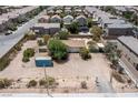 Aerial view of home with large lot featuring a storage container and minimal landscaping at 6337 W Cactus Ave, Las Vegas, NV 89141